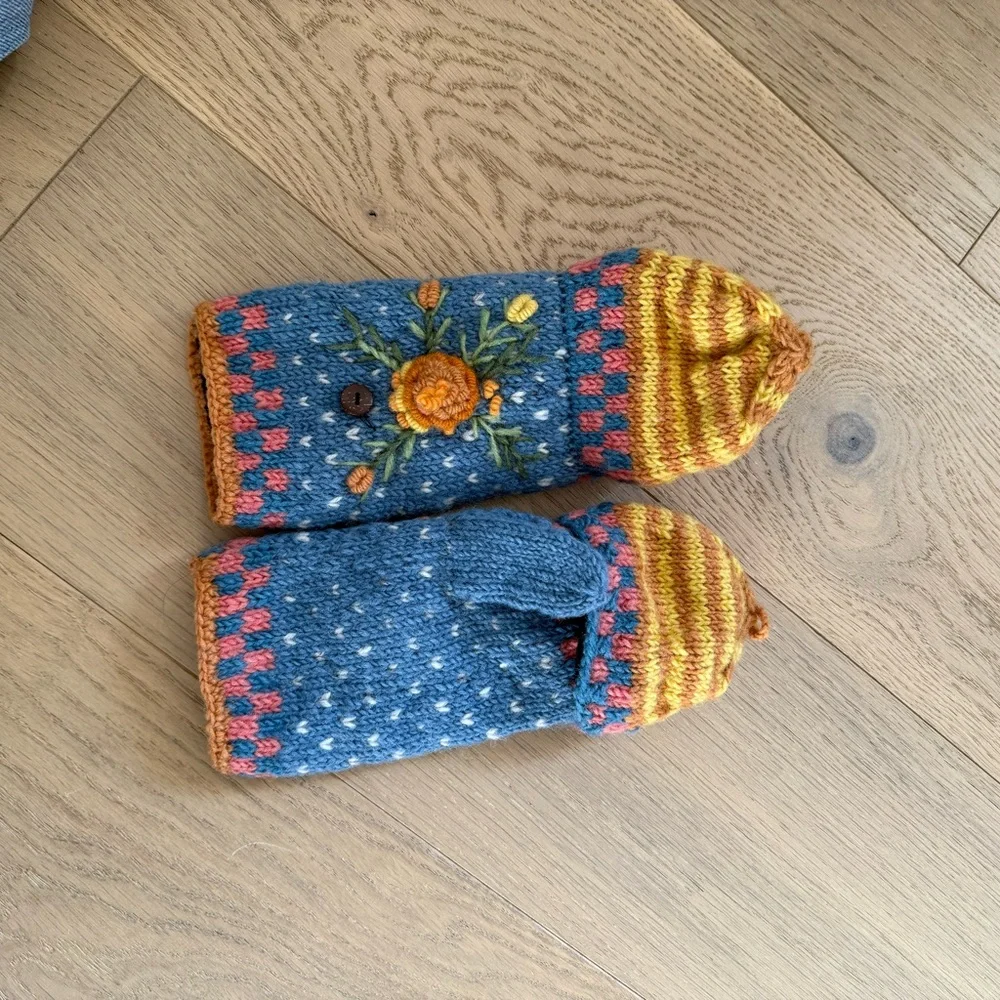 Whimsical Blue and Yellow Mittens with Playful Design